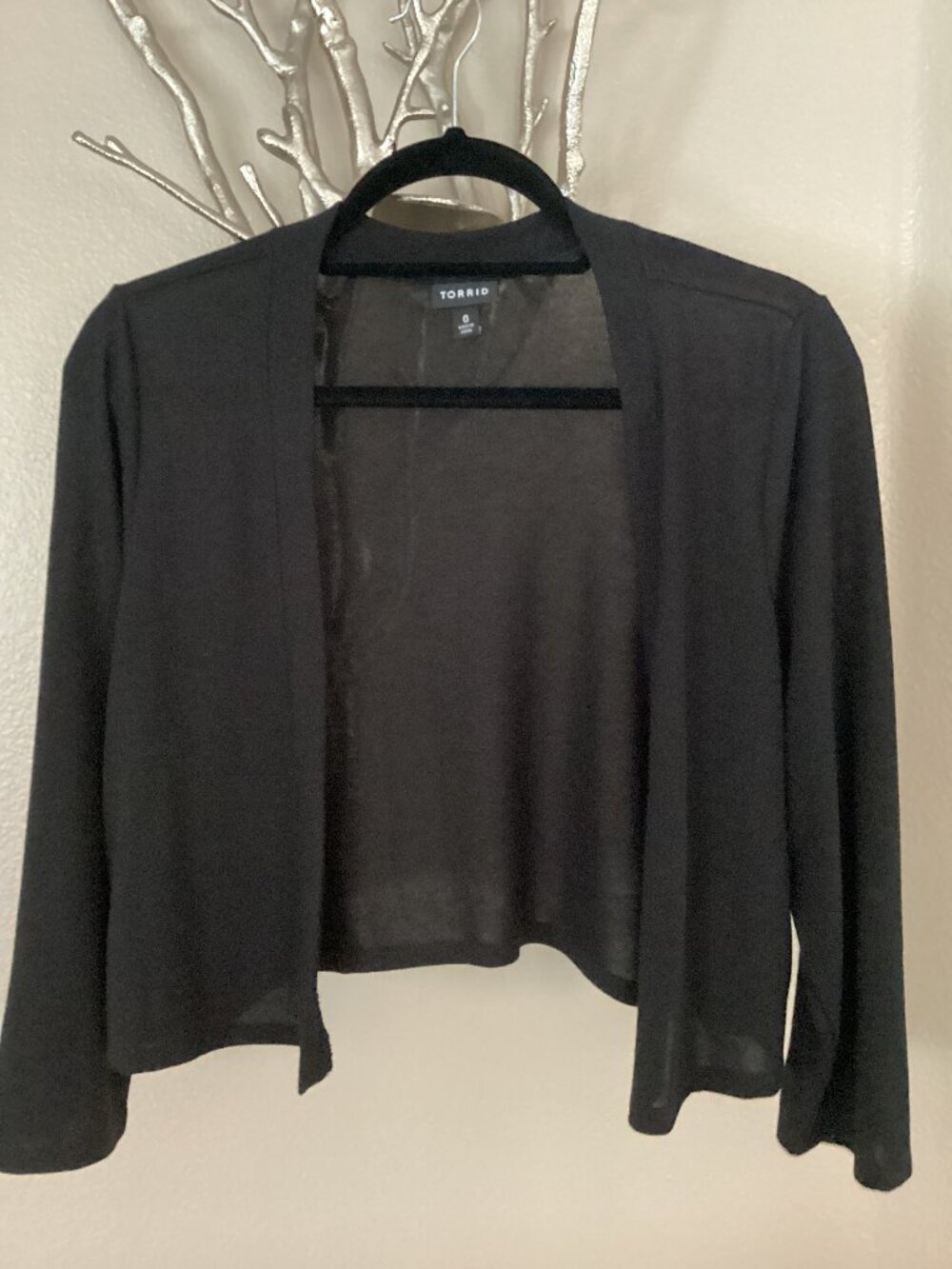 Torrid black shrug, women's top, size 0 but fits like a medium